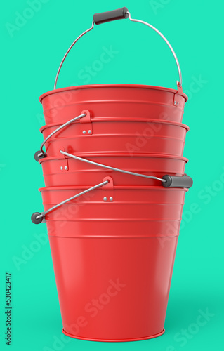 Set of metal garden buckets for hydration of plants isolated on green background