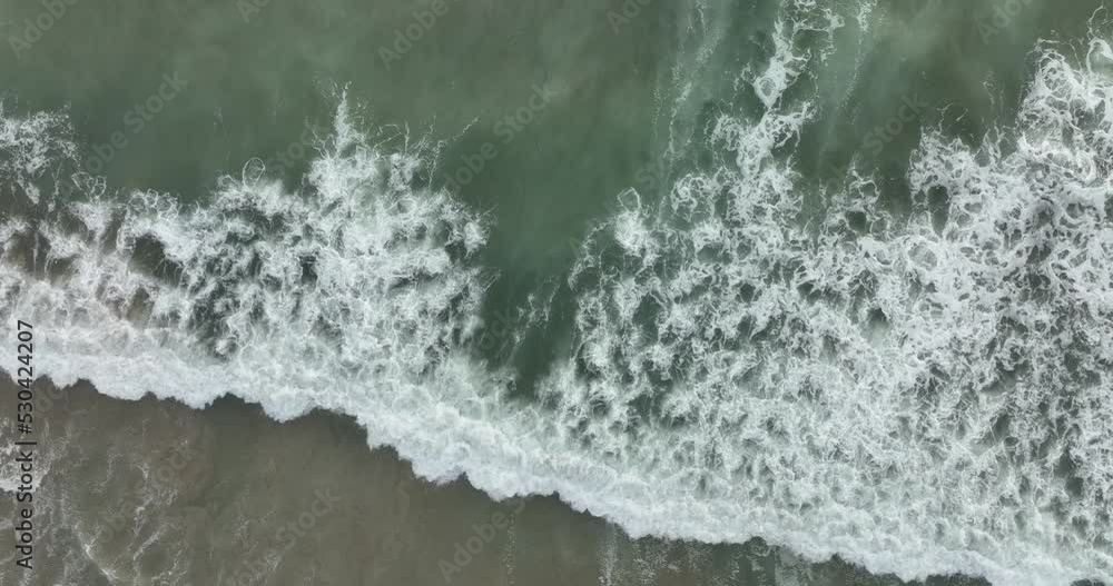 Waves of water of the sea. Waters of the ocean, swirl on the beach and scenic coastline. Waves of water of the sea. Waters of the ocean, swirl on the beach and scenic coastline.