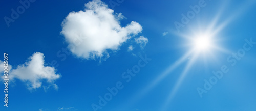 Bright sun on blue sky