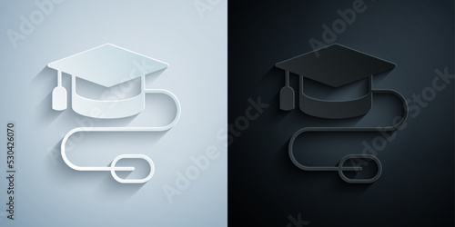 Paper cut Graduation cap with mouse icon isolated on grey and black background. World education symbol. Online learning or e-learning concept. Paper art style. Vector