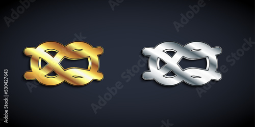 Gold and silver Nautical rope knots icon isolated on black background. Rope tied in a knot. Long shadow style. Vector