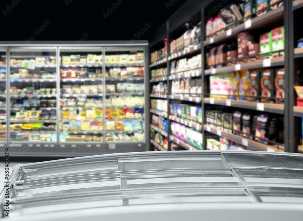 Choosing food from shelf in supermarket,vegetables in grocery section,Grocery stores