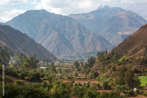 View of the Sacred Valley from the village of Urquillos, mountains and forest, in Peru. 