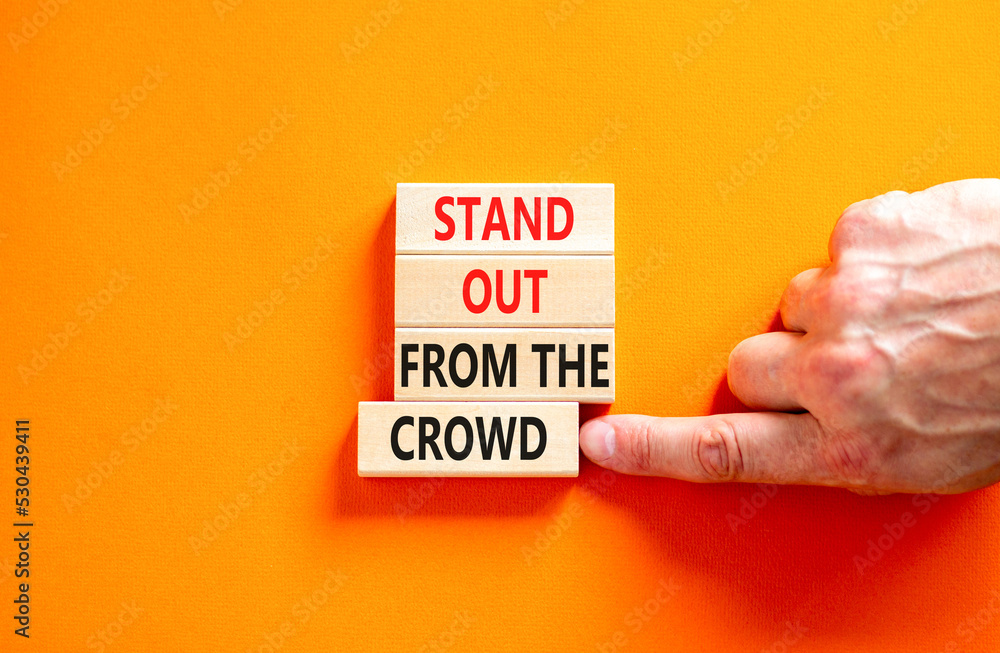 Stand out from the crowd symbol. Concept words Stand out from the crowd