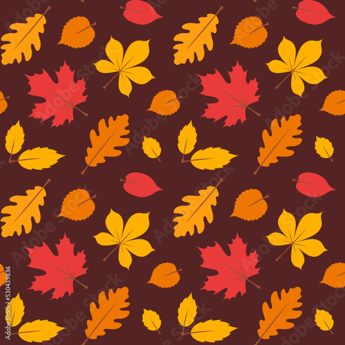 Autumn seamless pattern with yellow and red leaves on the brown background. Vector illustration. Design for wrapping paper, wallpaper, fabric, textile, scrapbooking, cover, autumn greeting card.