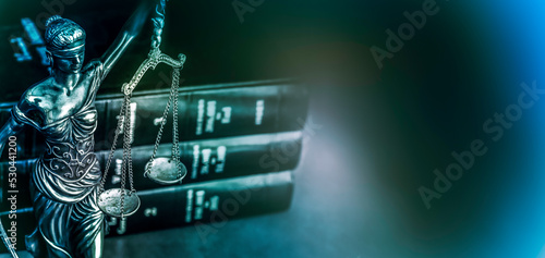 Legal law concept image - gavel and books on desk - cool tone.
