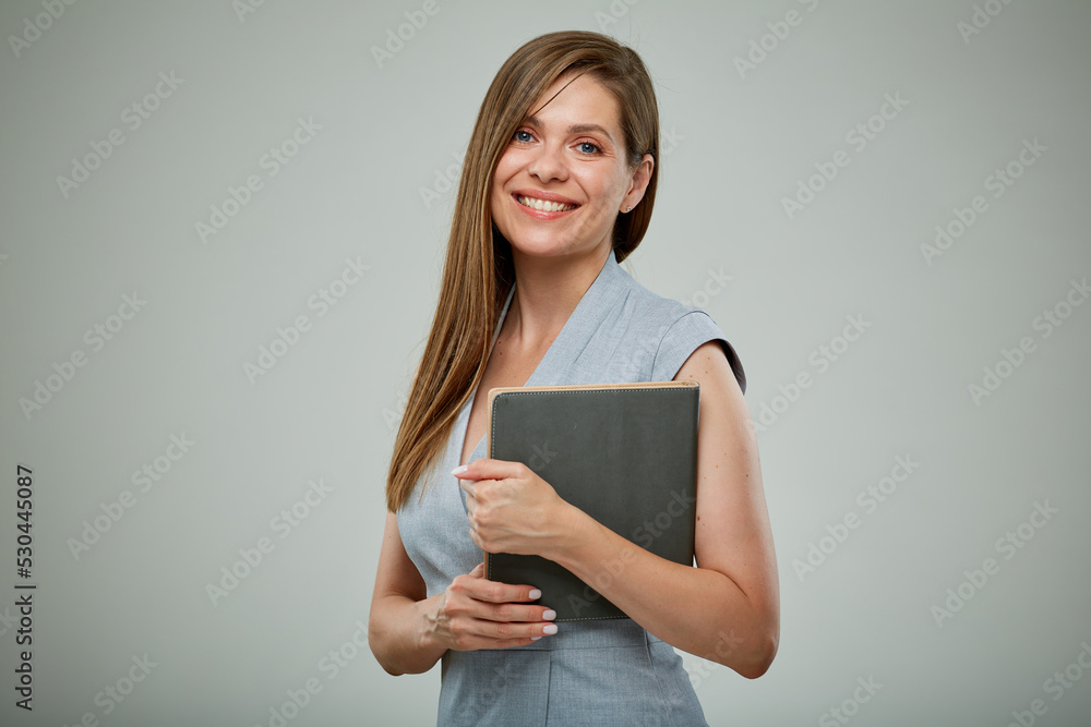 Smiling teacher or female businessperon with book. Isolated portrait. Smiling teacher or female businessperon with book. Isolated portrait.