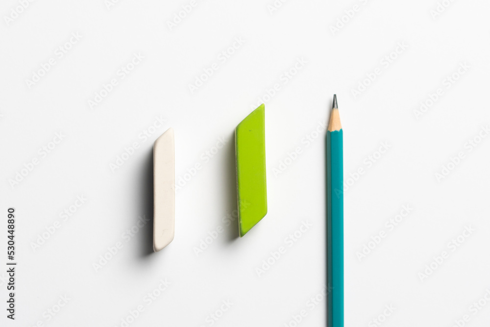 top view of the rubber eraser with pencil on pastel background top view of the rubber eraser with pencil on pastel background