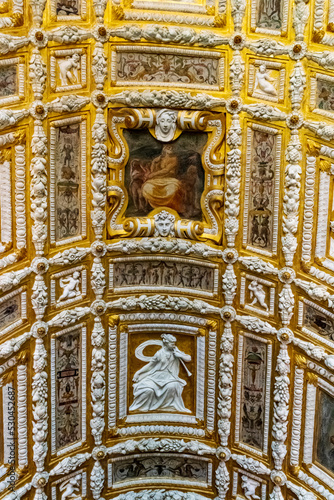 Beautifully decorated ceiling above staircase at the Doge's Palace