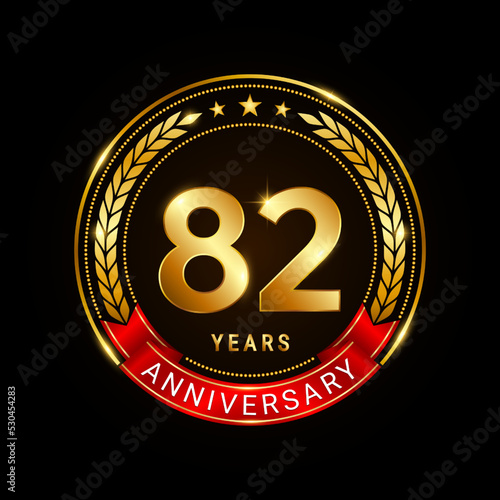 82 years anniversary, golden anniversary celebration logotype with red ribbon isolated on black background, vector illustration