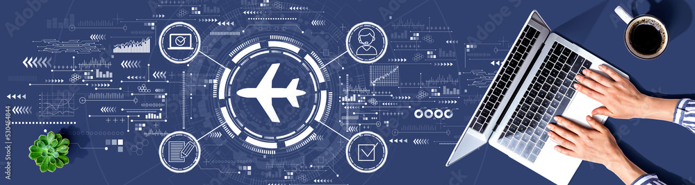 Flight ticket booking concept with person using a laptop computer Flight ticket booking concept with person using a laptop computer