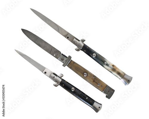 Three old switch blade knives isolated. Fototapet
