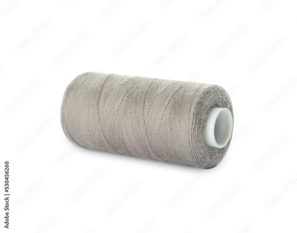 Spool of light grey sewing thread isolated on white Spool of light grey sewing thread isolated on white