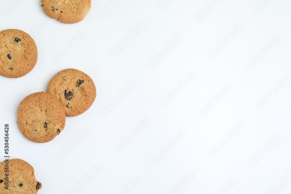 Tasty homemade cookies with raisins on white background, top view Tasty homemade cookies with raisins on white background, top view