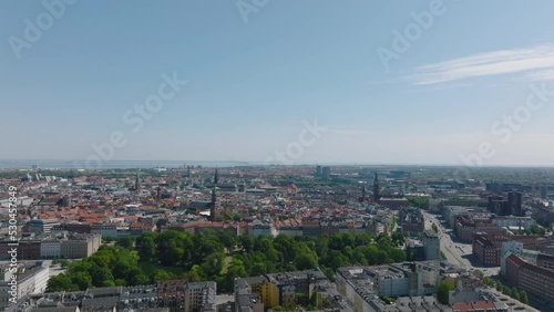 Wallpaper Mural Aerial ascending footage of buildings in historic city centre. Panoramic view of large city in flat coastal landscape. Copenhagen, Denmark Torontodigital.ca