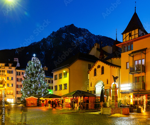 Stampa su tela Evening landscape of Christmas city streets in Brig, Switzerland