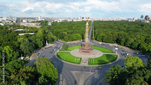 Busy traffic circle
Marvelous aerial view flight panorama orbit drone of siegessäule goldelse in Berlin Germany at summer midday September 2022. Marnitz 4k Cinematic from above photo