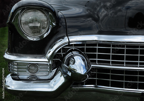 front headlight and grill of classic car © Terry