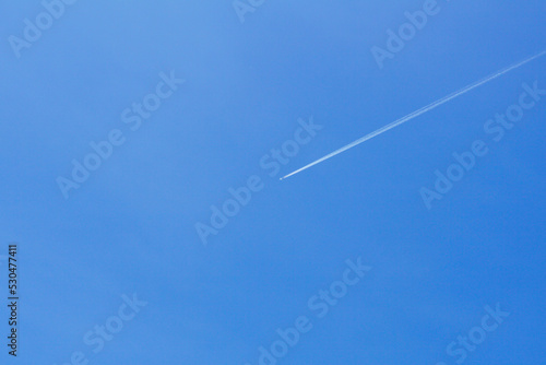 A passenger jet leaves a mark above the blue skies and the start of the airline after the kovic poisoning.