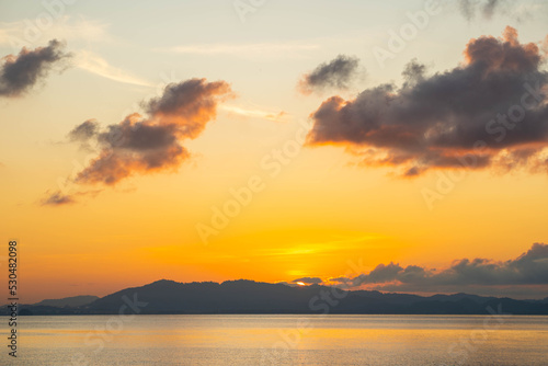 Beautiful sunrise over the sea © Sunanta