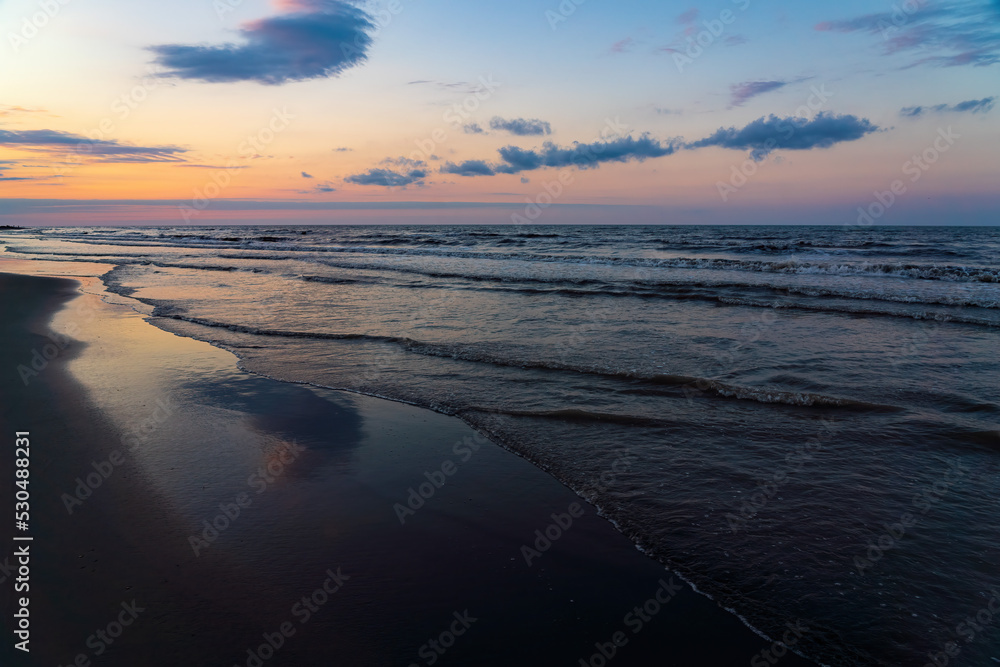Sea coast after a colorful sunset