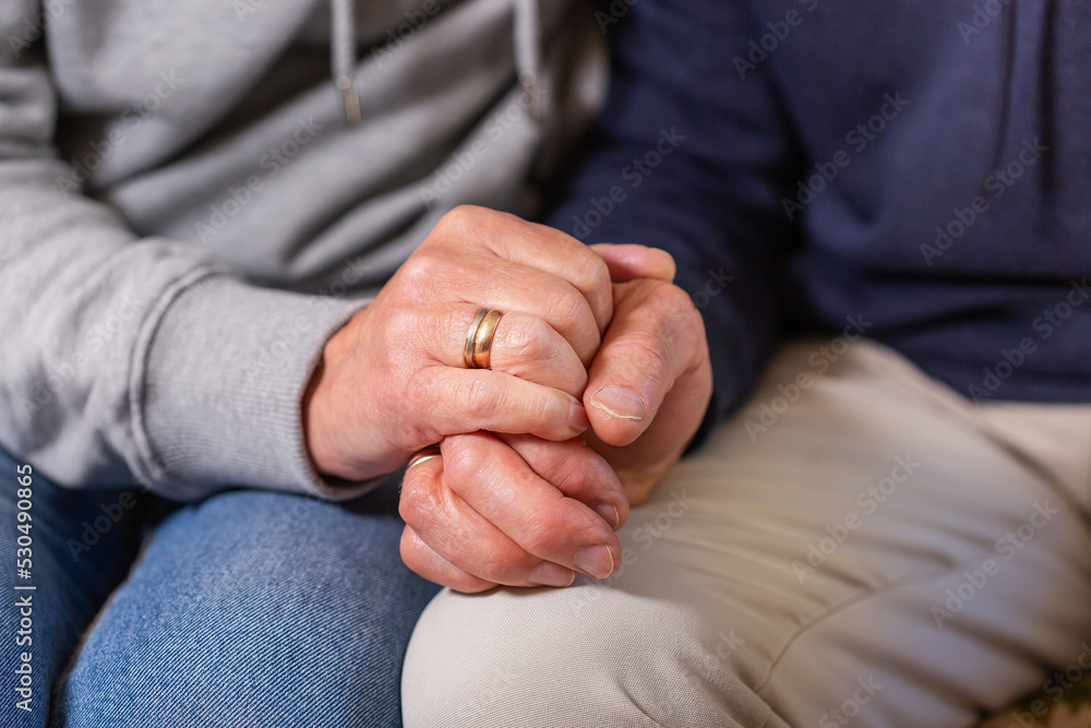Hands of senior couple holding together, care and support Hands of senior couple holding together, care and support