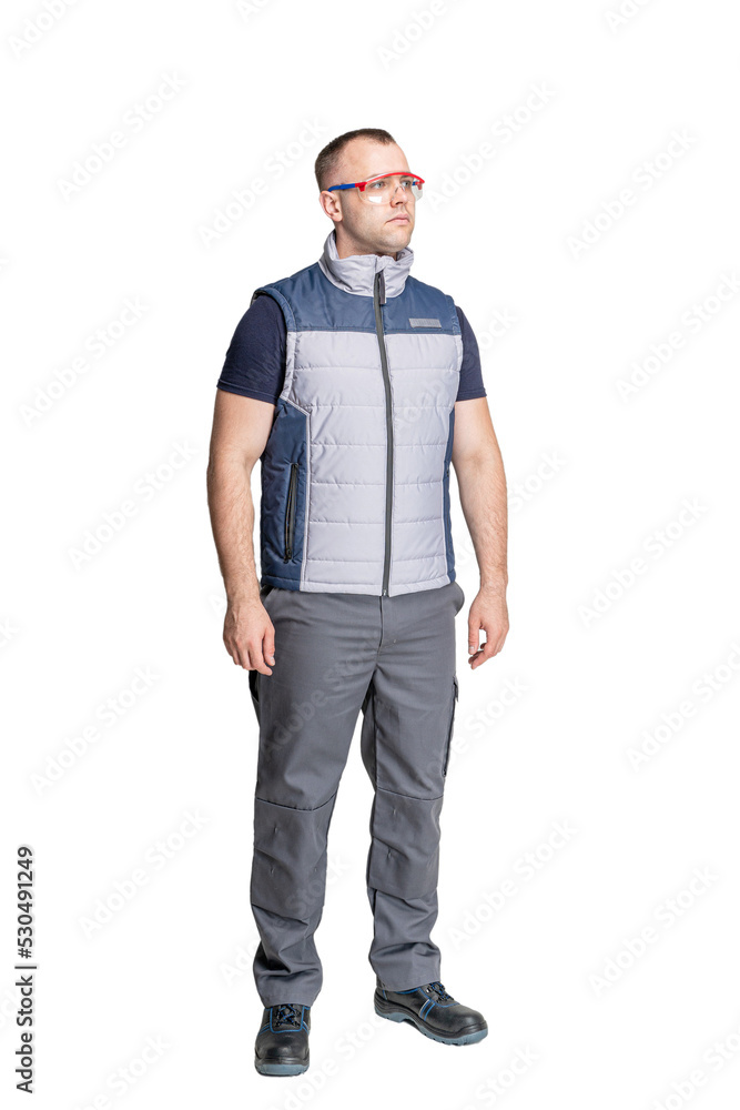 Fototapeta premium a man in special clothes for workers wearing protective glasses on a white isolated background