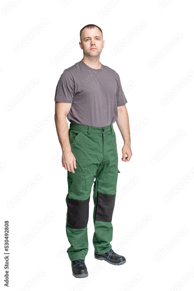 man in special clothes for workers on a white isolated background. a man in uniform man in special clothes for workers on a white isolated background. a man in uniform