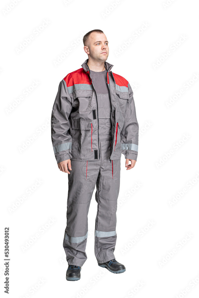 Naklejka premium man in special clothes for workers on a white isolated background. a man in uniform