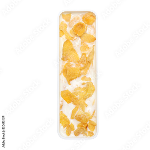 cornflakes cereal with milk in alphabet plate