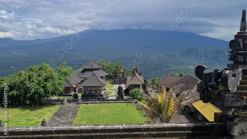 Pura Penataran Agung Lempuyang Hindu Temle Complex and Clouds Above Montain Hills and Valley, Bali Island, Indonesia photo