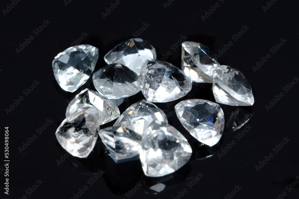 Natural gemstone white topaz on black background Natural gemstone white topaz on black background