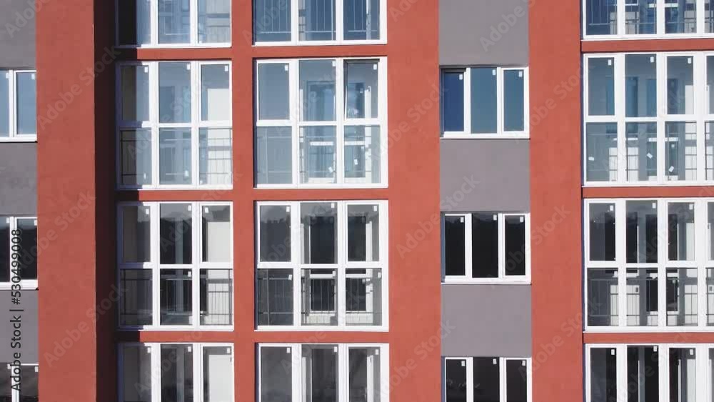 Aerial view of the facade of a residential new building. Aerial view of the facade of a residential new building.