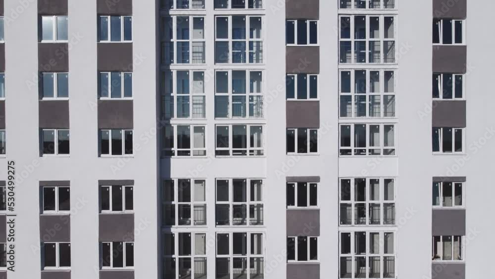Aerial view of the facade of a residential new building. Aerial view of the facade of a residential new building.