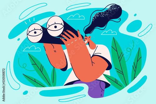Smiling woman with binoculars discover new horizons 