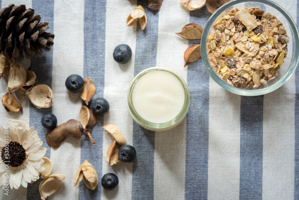yogurt with fresh blueberry on a wooden background. healthy cereal morning breakfast,oat yogurt with fresh blueberry on a wooden background. healthy cereal morning breakfast,oat