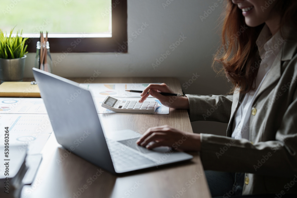 Businesswoman with many financial document to audit budget of company. tax, bill, account concept Businesswoman with many financial document to audit budget of company. tax, bill, account concept