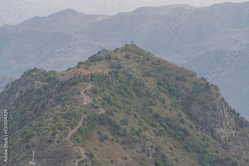 Smbataberd, a fortress located southeast of the village of Artabuynk formerly Yeghegis in Vayots Dzor in Armenia, on a mountain peak, 5th century, the road leading to the fortress photo