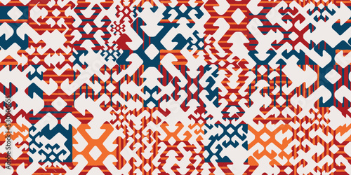 Seamless pattern in patchwork style. Embroidered print for carpet, textile, wallpaper, wrapping paper. Ethnic and tribal motifs. Handwork. Vector illustration.