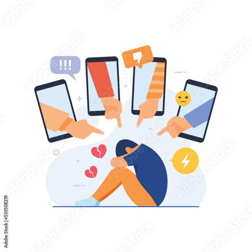 Cyber bullying in social networks and online abuse concept. Young man crying in front of laptop screen due to haters messages