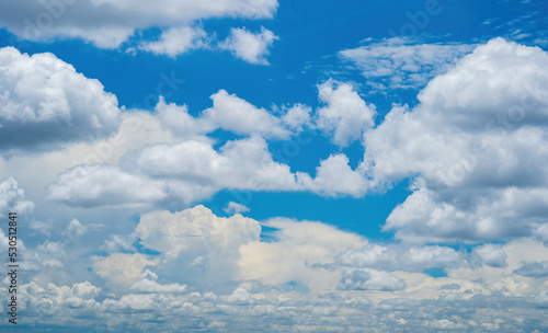 Blue sky background with clouds. Clear blue sky and white clouds in summer time. white clouds moving fast