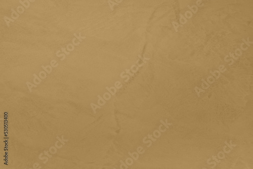 Saturated pastel greenish beige colored low contrast Concrete textured background. Empty colourful wall texture with copy space for text overlay and mockups. 2023, 2024 color trend
