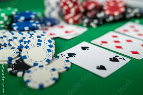 Poker cards with three of a kind or set combination. photo