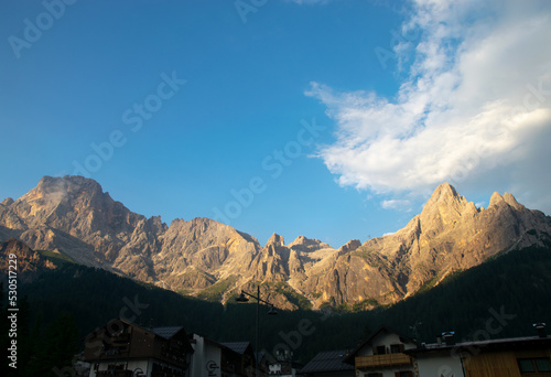 sun illuminating the mountains at sunset