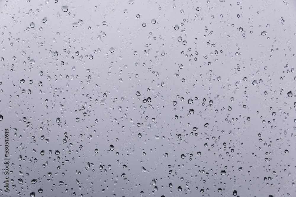 Decorative abstract background. Texture of water drops on glass