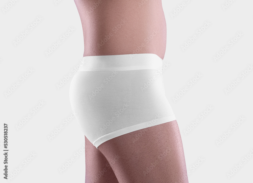 Mockup of white male trunks on the guy's shaved body, brief boxers close-up, back view, isolated on background. Mockup of white male trunks on the guy's shaved body, brief boxers close-up, back view, isolated on background.