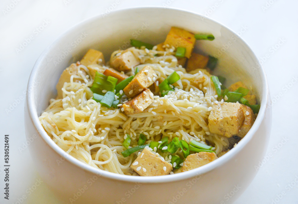 A homemade vegan pasta with greens and tofu. Good for any project.