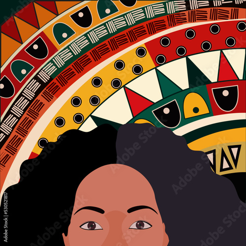 the face of a dark-skinned girl on the background of an African ornament