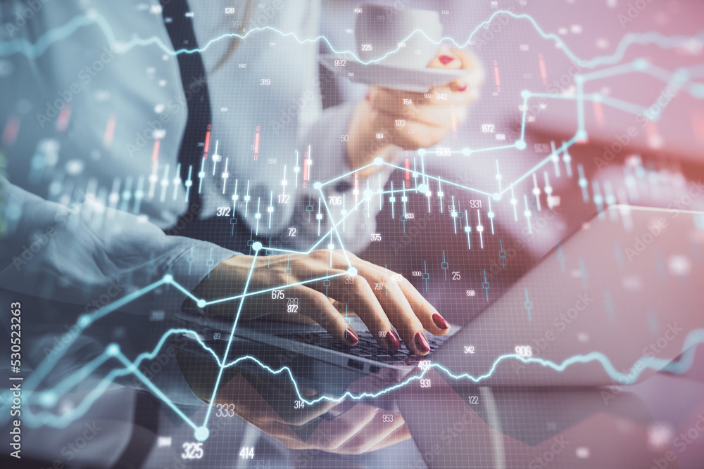 Double exposure of businesswoman hands typing on computer and financial graph hologram drawing. Stock market analysis concept. Double exposure of businesswoman hands typing on computer and financial graph hologram drawing. Stock market analysis concept.