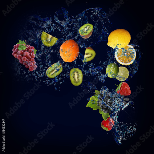 Wallpaper with fruits in water - juicy grapes, kiwi, lemon, orange, strawberry, lime are very tasty and nutritious